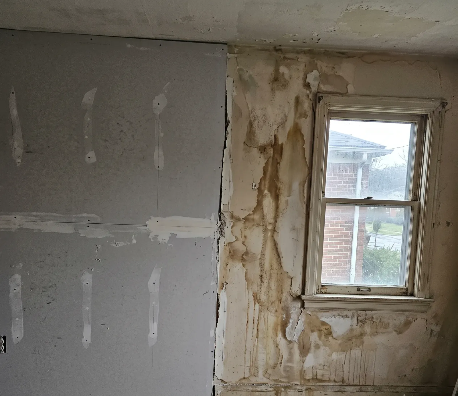 Professional water damage restoration technician treating a home foundation in Atlanta, GA
